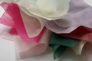 Non-woven fabric made from recycled rPET flakes.